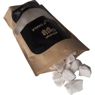Magnésie en vrac Getta Grip 200 g : sachet brun ouvert déversant des morceaux blancs de magnésie.