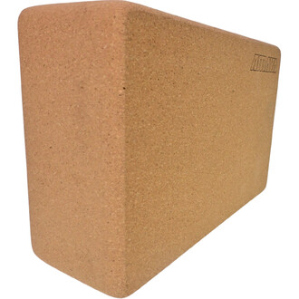 Brique de yoga en liège, couleur beige, avec un aspect rugueux et naturel. Design rectangulaire avec des bords légèrement arrondis. Logo de la marque gravé sur le côté.