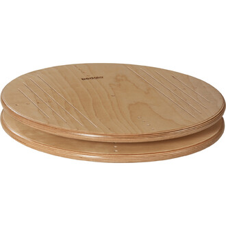 Carrousel pour enfants Pedalo® 500 en bois, composé de deux plateformes circulaires superposées avec des rainures sur la surface. Le logo Pedalo est visible sur le dessus.