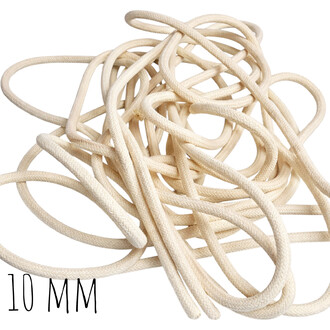 Corde Kevlar beige de 10 mm, emmêlée en tas avec texture tressée visible.