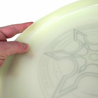 Showing the bottom curvature of a frisbee