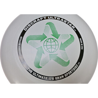 Frisbee Ultrastar Discraft blanc avec un motif en forme d'étoile verte et un globe au centre. Texte noir entourant le disque : DISCRAFT ULTRASTAR, POST CONSUMER RECYCLED, MADE IN USA et THE ULTIMATE 175 GRAM SPORTDISC.