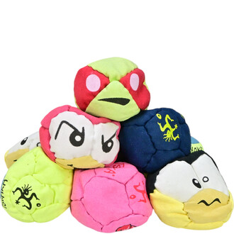 Kit de 24 balles TSHAKA empilées, présentant différentes couleurs vives et motifs amusants, avec des visages expressifs et des designs ludiques. Les balles sont en forme ronde et conviennent pour la jonglerie et le jeu.