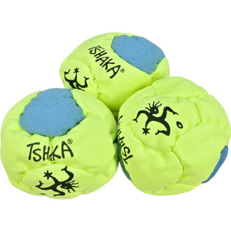 Balles de jonglerie TSHAKA dans des couleurs vives : jaune fluorescent avec des zones bleues. Trois balles sont disposées, présentant le logo TSHAKA sur chaque balle.