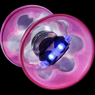 Disque translucide rose du kit Hyperspin Fixe Lumineux Fluxo avec unité centrale noire et LEDs bleues.