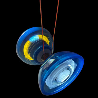 Bloc LED pour Fluxo 2k, avec deux disques en plastique transparent bleu, illuminés par des lumières LED internes, suspendus par des cordes. L'image présente un fond noir mettant en valeur les couleurs vives des LED, créant un effet dynamique.