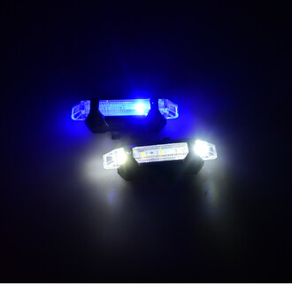 Bloc LED pour Fluxo 2k, comprenant deux unités lumineuses, l'une émettant une lumière bleue et l'autre une lumière blanche, sur un fond sombre.