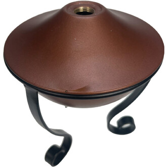 Vue en gros plan du dessus d’une lampe torchière moderne, abat-jour rond brun cuivré avec orifice central et pieds en métal noir incurvés.