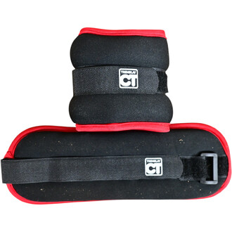 Leste Chevilles et Poignets, avec deux poids noir et rouge, l'un en forme de bracelet pour le poignet et l'autre en forme plus large pour la cheville, dotés de sangles ajustables.