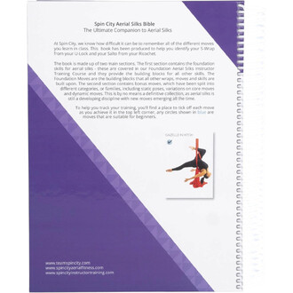 Couverture arrière du livre Spin City Aerial Silks Bible, reliure spirale blanche à droite, design blanc et violet avec texte descriptif et une petite photo montrant une figure d’acrobatie aérienne.