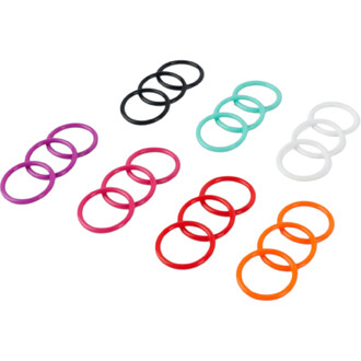 Lot d’anneaux en silicone multicolores utilisés comme marqueurs F-Grip, disposés sur fond blanc.