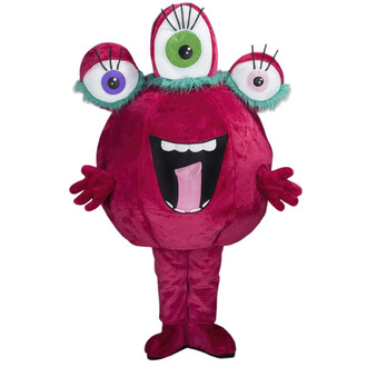 Mascotte alien rose avec un corps rond et poilu, aux grands yeux colorés (vert, violet et rose), souriante avec une large bouche. Elle a des bras et des gants roses, se tenant dans une pose amicale.