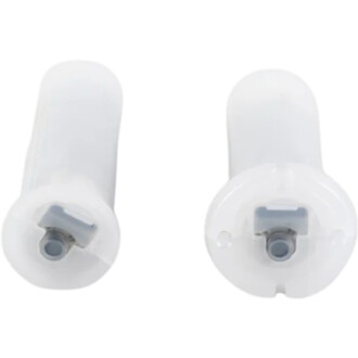 Deux modules LED Lumi blancs en gros plan, leurs têtes translucides et les connecteurs gris visibles sur les socles.