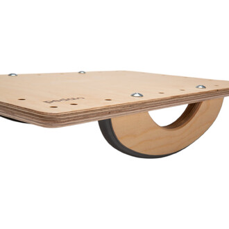 Plateforme de jonglerie en bois, dotée d'un design innovant avec un rouleau en dessous. La surface est lisse avec des vis visibles et un logo de la marque pedalo. Idéale pour la pratique de l'équilibre et de la coordination.