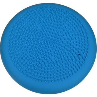 Disque bleu en caoutchouc avec une surface texturée et des picots, utilisé pour l'équilibre et l'exercice.