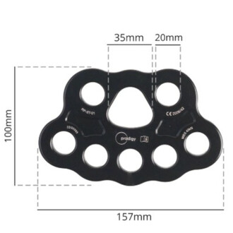 Plaque d’ancrage aérienne Prodigy noire, forme ondulée avec plusieurs trous de fixation circulaires et une grande ouverture centrale; dimensions 157 mm × 100 mm.