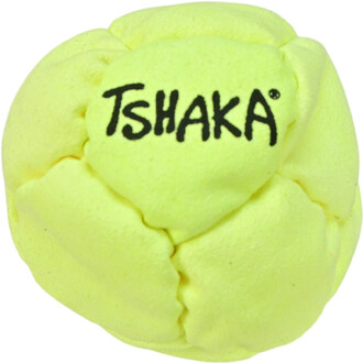 Boulette de jonglage de marque TSHAKA, de couleur jaune vif, avec un logo noir TSHAKA sur le dessus. La balle présente une texture douce et une forme arrondie avec des coutures visibles.