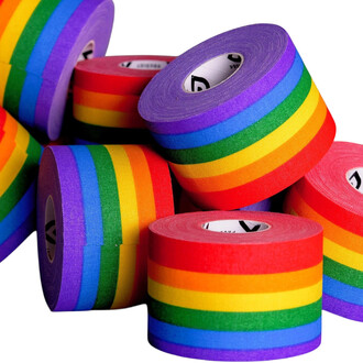 Several rolls of Snake Tape Prodigy in rainbow colors stacked on top of each other.