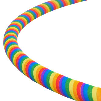Close-up of Snake Tape Prodigy Rainbow, a colorful spiral-wound adhesive tape with multicolored rainbow stripes (red, orange, yellow, green, blue, purple).