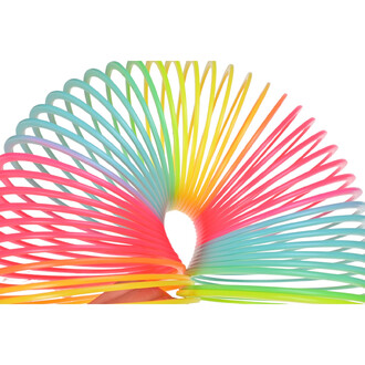 Springy Arc-En-Ciel Géant en position dépliée, montrant un éventail de couleurs vives allant du rose au bleu, avec des courbes sinueuses et une forme en spirale. L'image met en évidence la flexibilité et la diversité des couleurs de ce jouet.