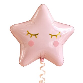 Ballon en forme d'étoile rose pastel avec yeux fermés et cils dorés et joues roses.