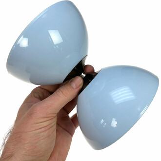 Taibolo Super held in one hand which allows you to have a visual of the scale of the diabolo.