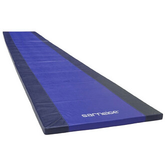 Matelas de jonglerie bicolore de 12 mètres avec une surface principalement violette et des bords noirs, conçu pour offrir un espace sécurisé pour la pratique de la jonglerie et d'autres activités acrobatiques.