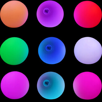 Neuf balles lumineuses LED LUMI-PRO disposées en grille 3x3 sur fond noir, affichant une variété de couleurs vibrantes (orange, violet, rouge, vert, bleu, lilas et rose).