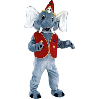 Mascotte en costume d'éléphant clown, avec un vêtement gris, un gilet rouge décoré de pois colorés, et un chapeau pointu assorti. L'éléphant a des grandes oreilles blanches et des dents proéminentes, se tenant les bras légèrement écartés dans une pose lud