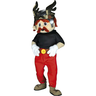 Costume de personnage inspiré des Gaulois, avec un casque à cornes, un haut noir, une ceinture rouge et un pantalon rouge. Le personnage a des cheveux roux et une moustache.