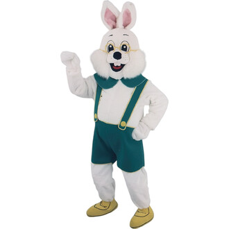 Mascotte Jeannot Lapin en costume blanc avec des oreilles de lapin, portant des lunettes et une grande bouche souriante. Il est vêtu d'une salopette verte avec des bretelles et des chaussures jaunes, levant une main en signe de salutation.