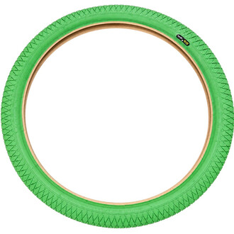Pneumatico verde per cerchio Qu-ax da 20x1,95 pollici, vista circolare con battistrada a rombi e fianco beige.